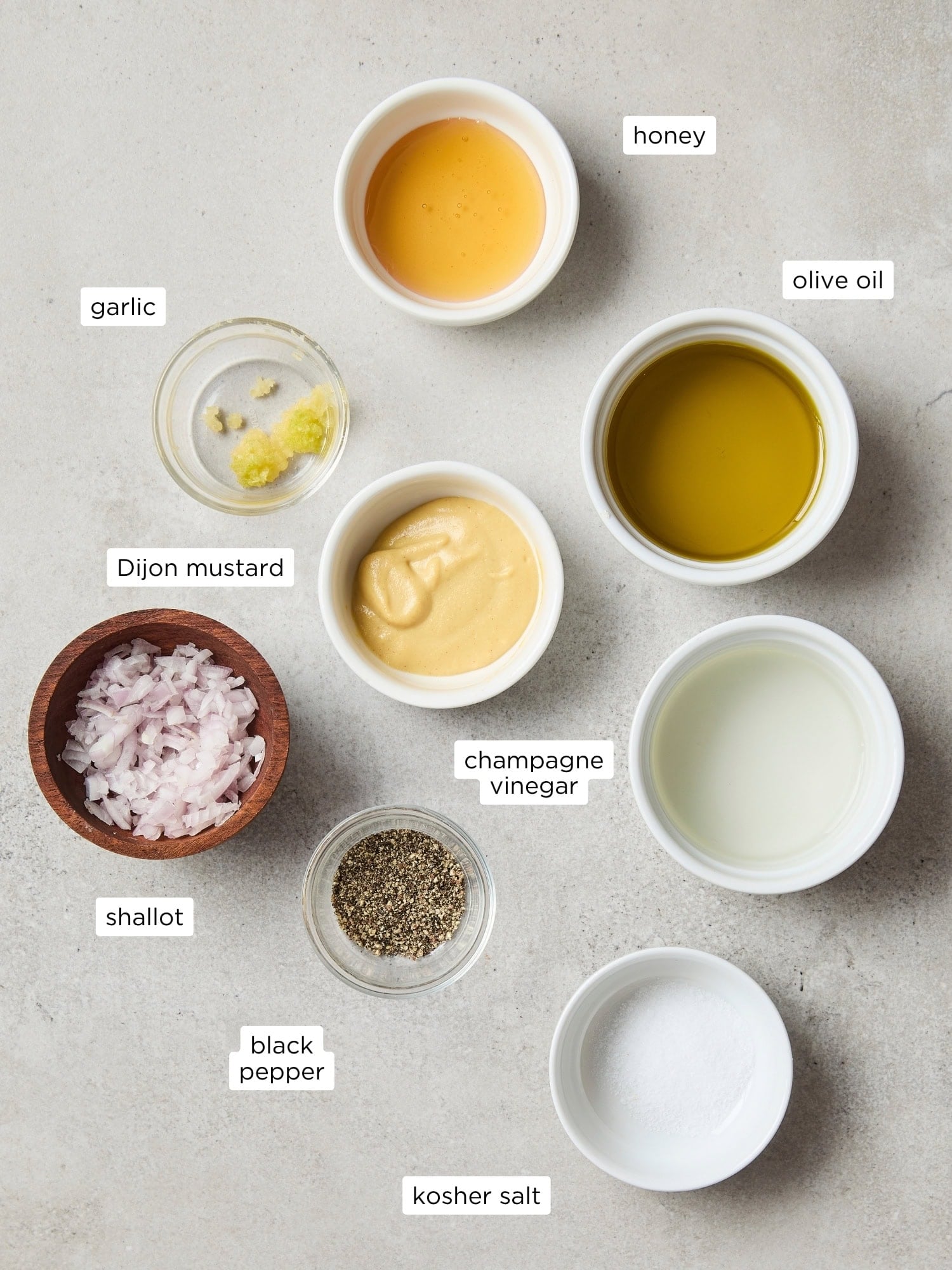 Ingredients needed for a creamy Dijon vinaigrette.