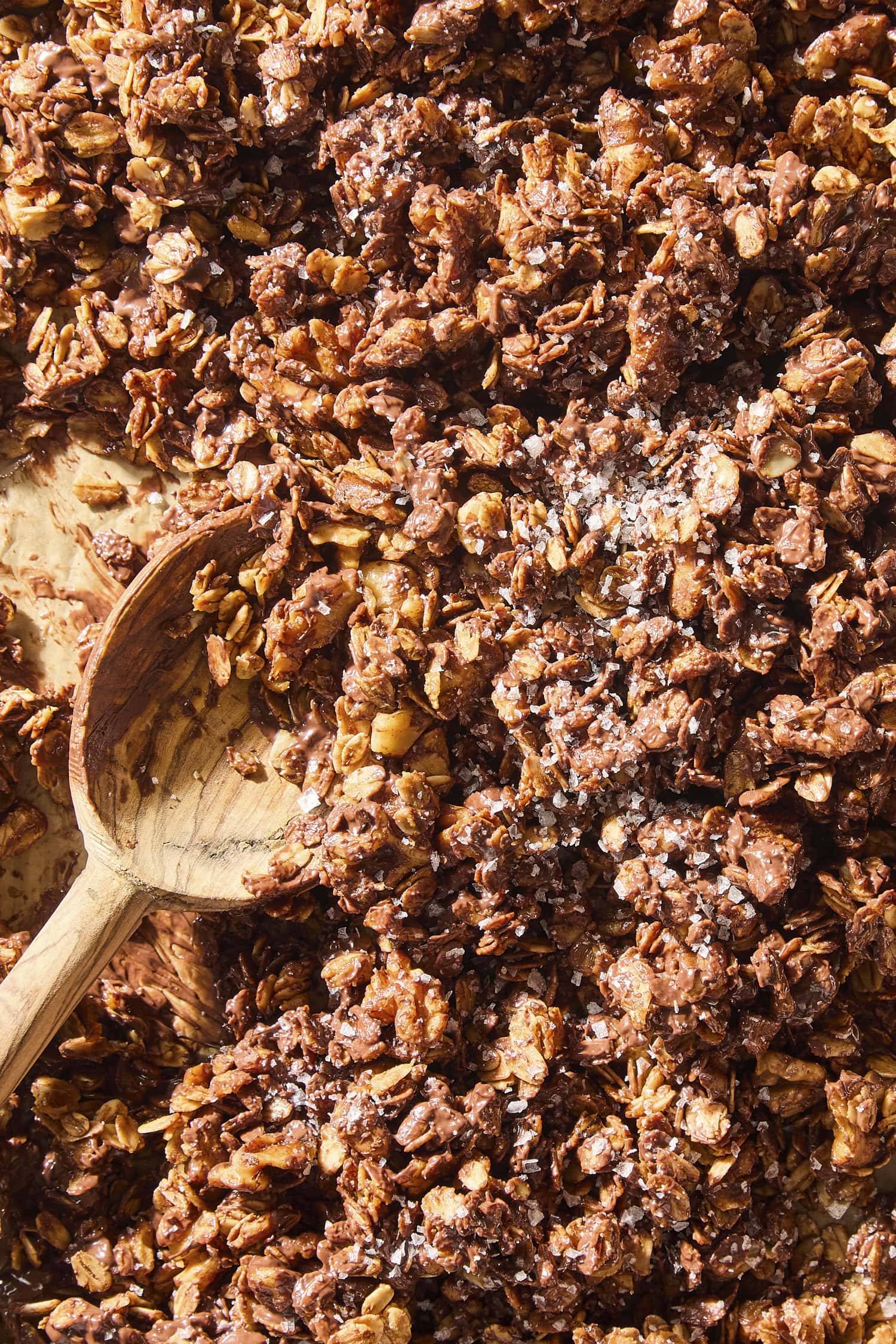 Oatmeal chocolate granola in craggy pieces.