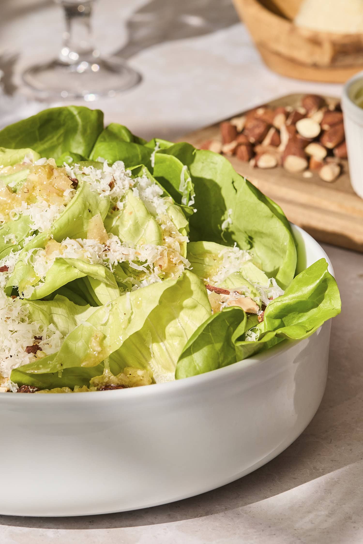 Little Gem lettuce with vinaigrette drizzled on top.