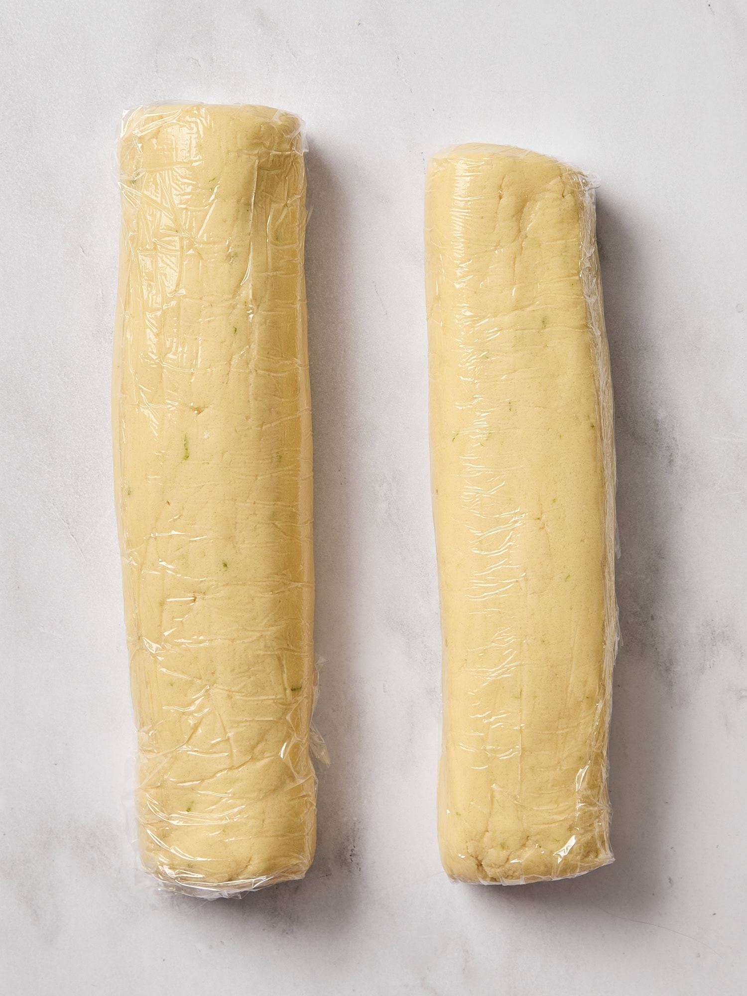 Two dough logs for slice and bake sugar cookies.