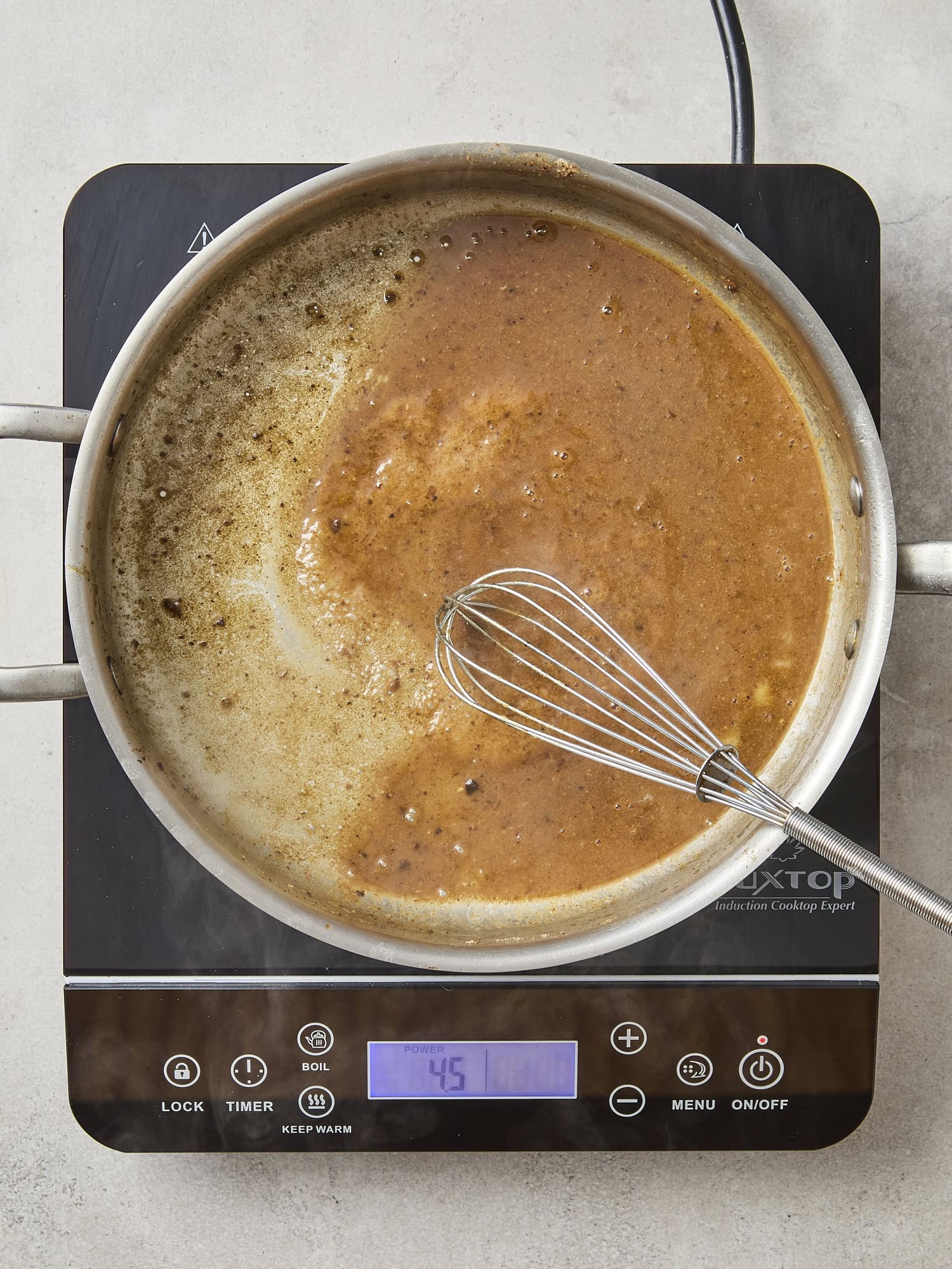 Pan sauce in skillet for pork tenderloin.