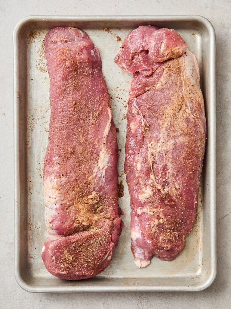 Seasoned pork tenderloin pieces.