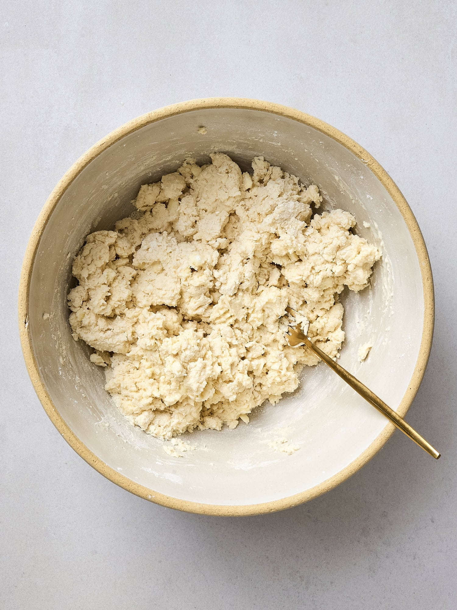 Dough for biscuits with wet ingredients added.