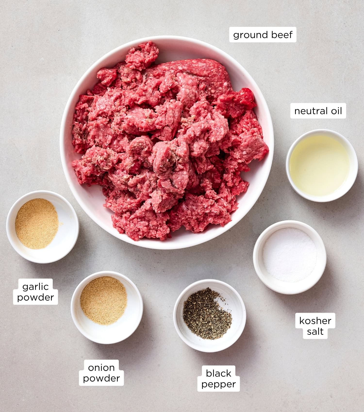 Ingredients for a grilled burger recipe.