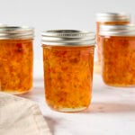 Jars of hot pepper jelly after being canned.