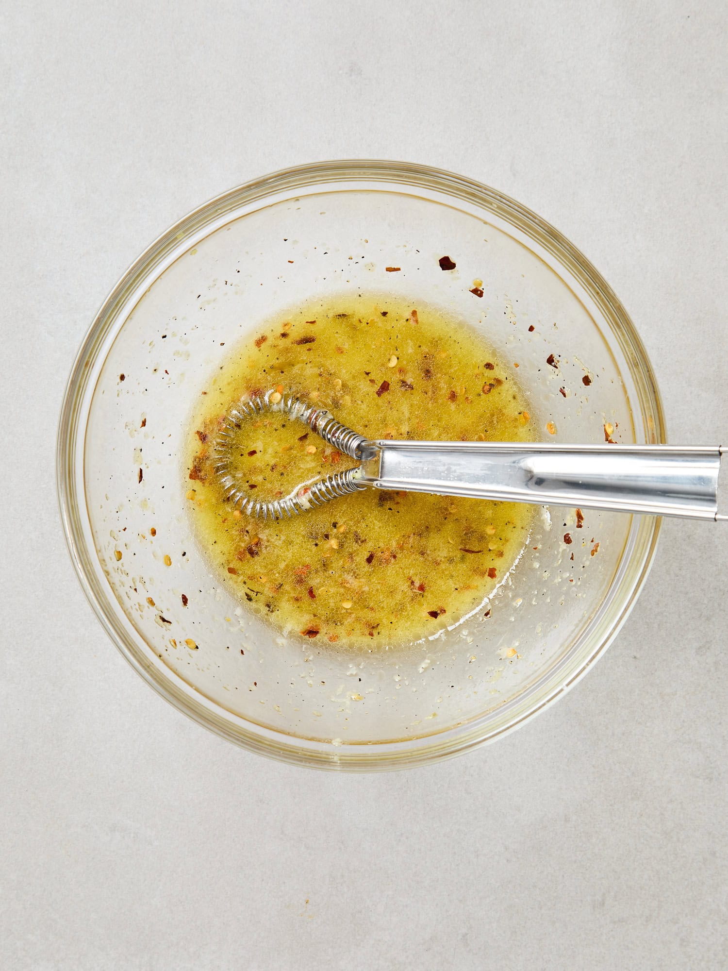 Spicy vinaigrette for kale salad mixed together.