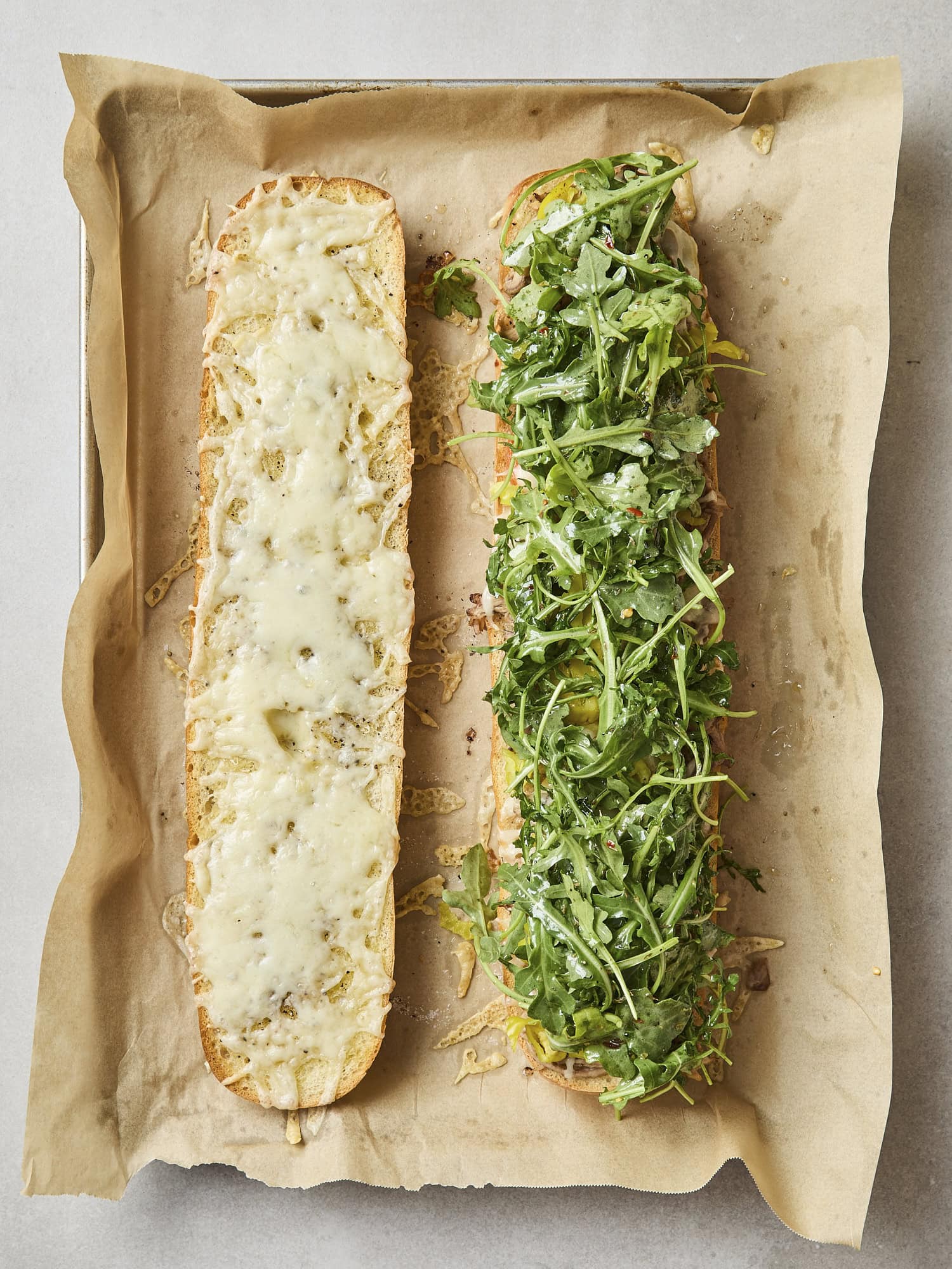 Mixed greens on pork sandwich.