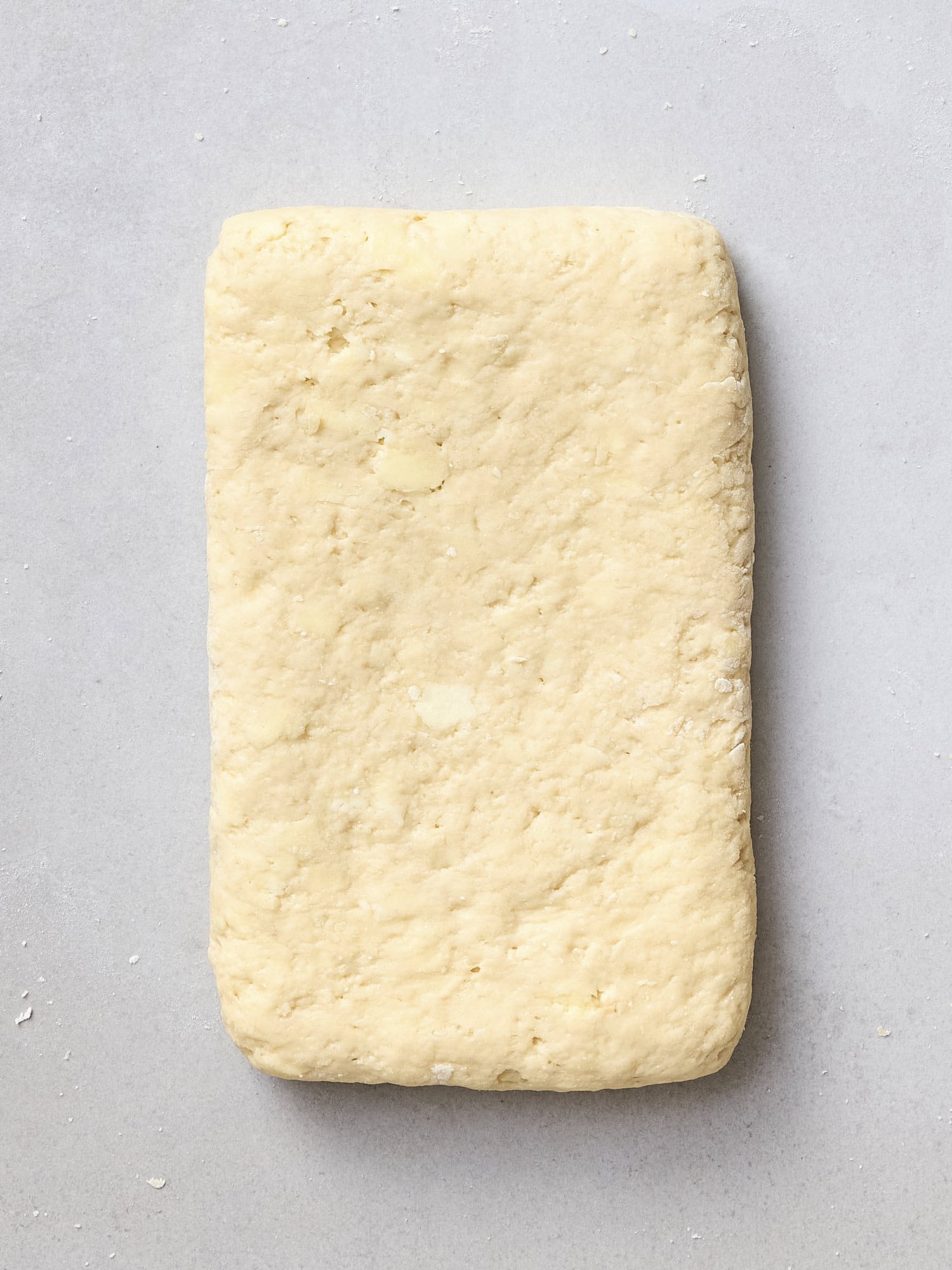 Rolled out dough for sweet biscuits.