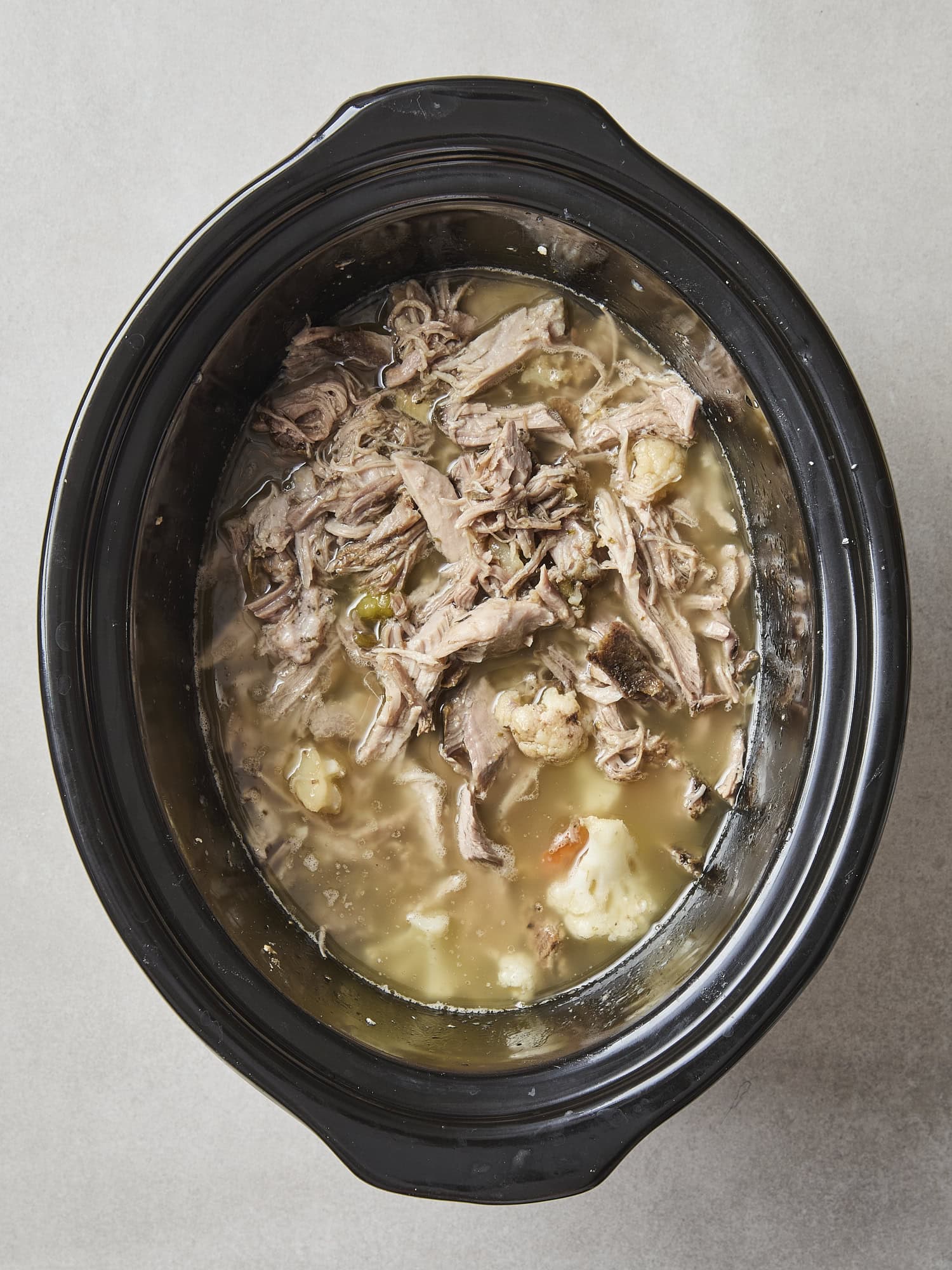 Shredded pork for sandwiches in slow cooker.