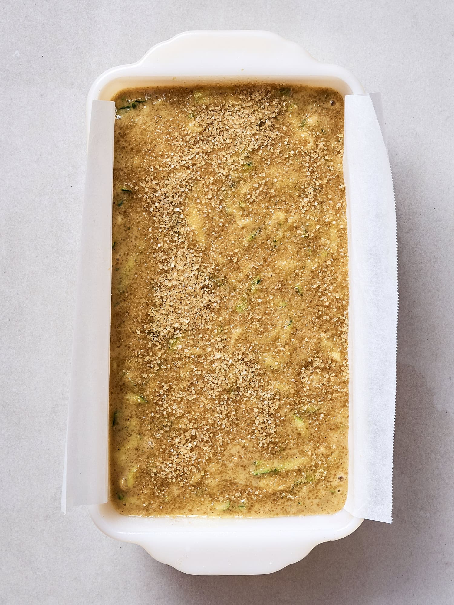 Unbaked zucchini bread in loaf pan.