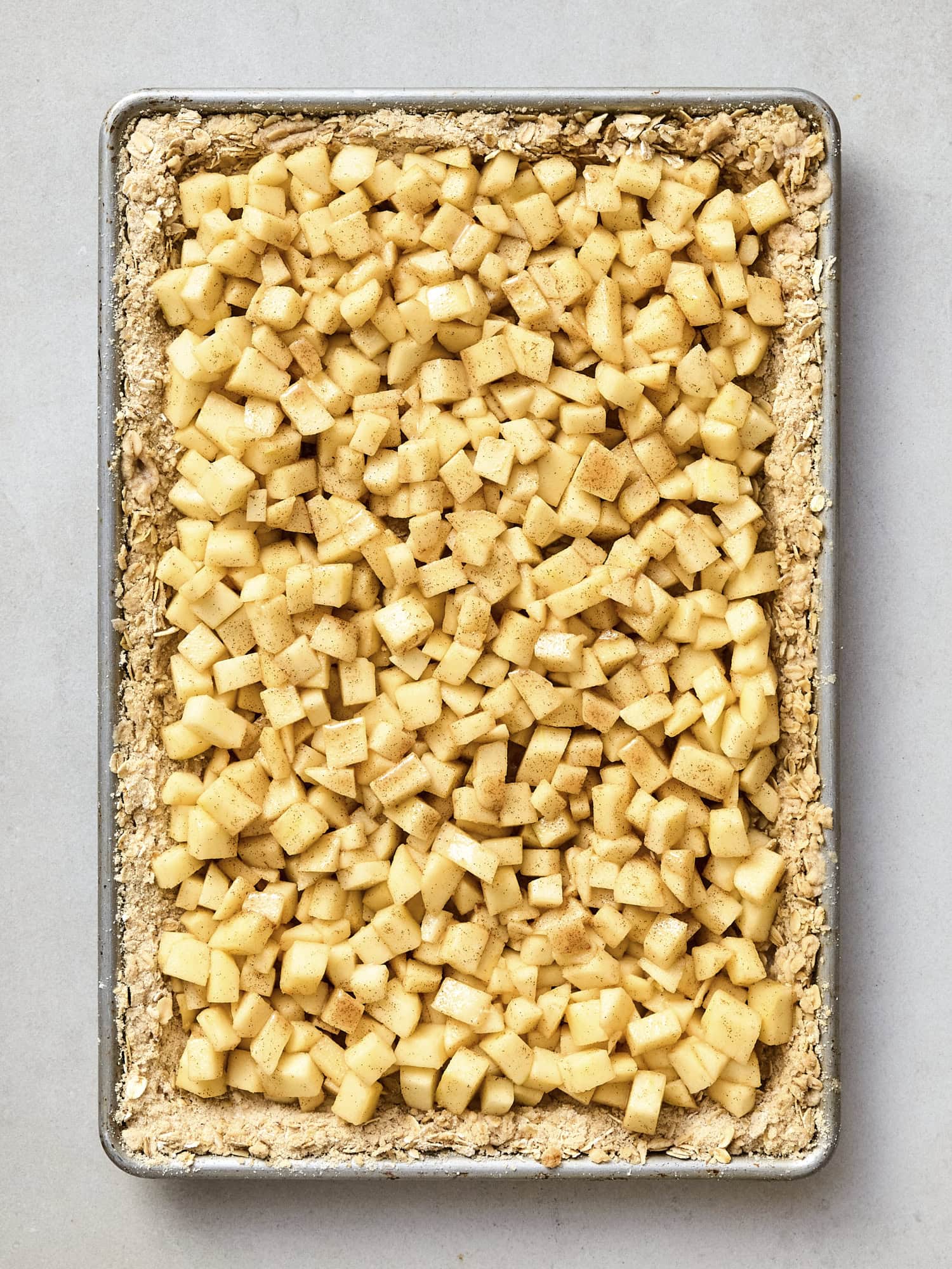 Oat crust with apple mixture poured over the top.