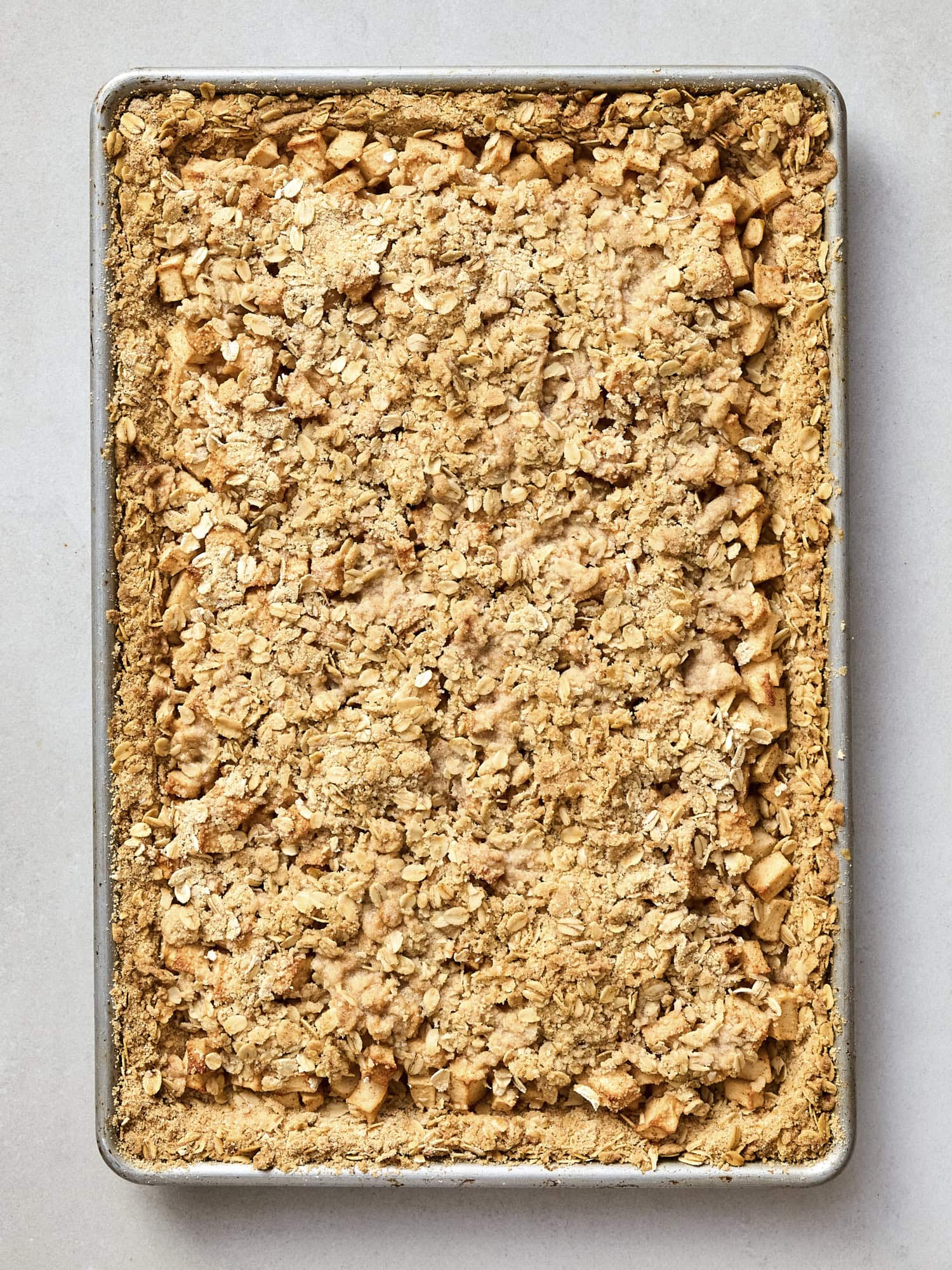 Baked apple pie bars still in pan.