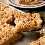 Spatula with a slice of an apple pie bar.