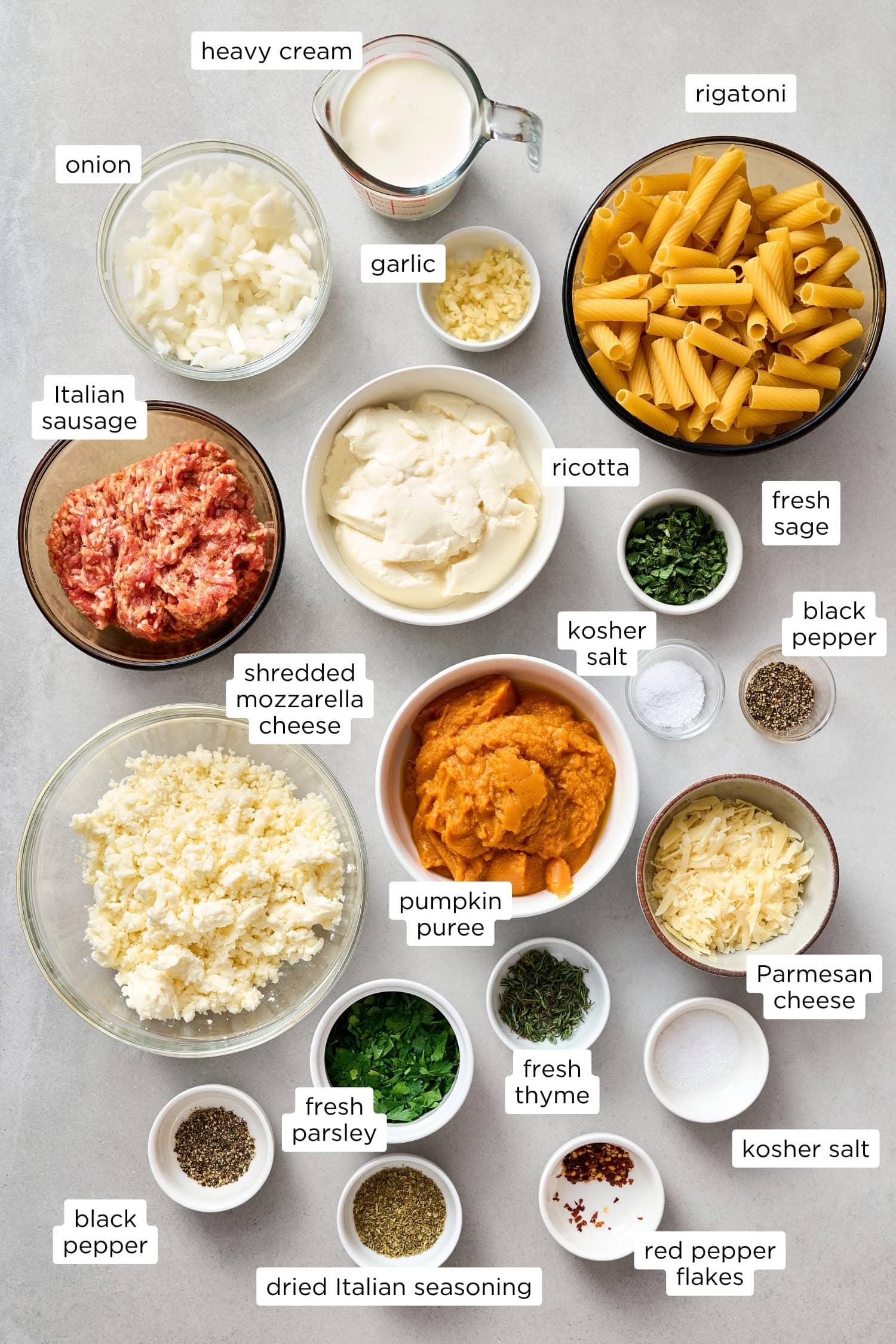 Ingredients needed for a pumpkin baked ziti recipe.