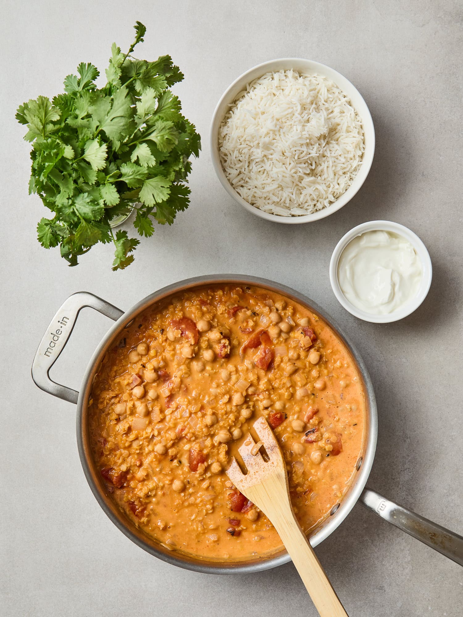 Chickpeas and red lentil curry recipe after simmering in a skillet.