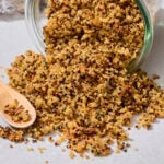 Jar filled with cooked crispy quinoa recipe.